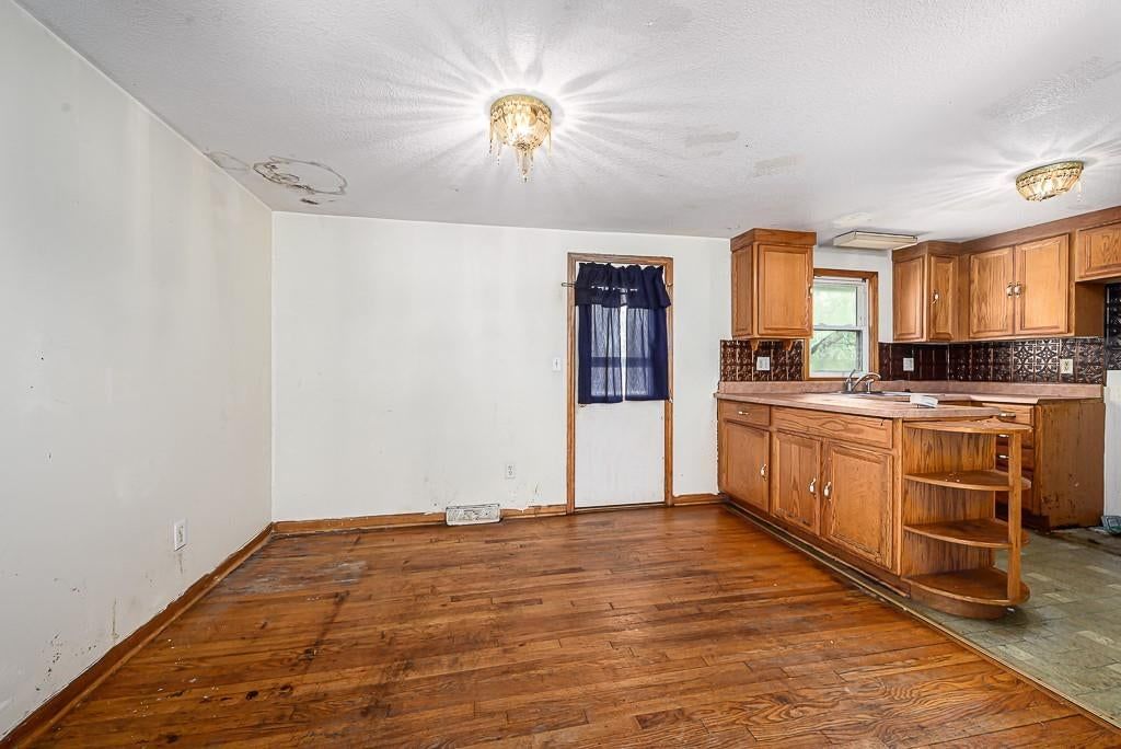 Open floor plan and breakfast nook at 5530 sloan Avenue, Kansas City, KS 66104