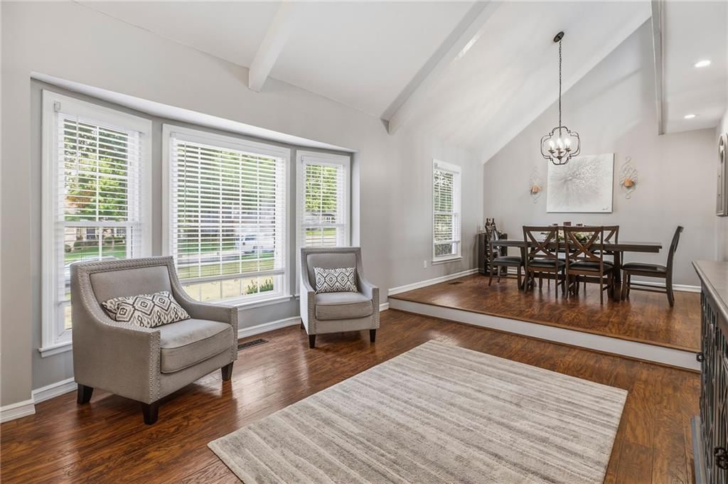 Tall ceilings, hardwood floors and ceiling beams at 14513 90TH Court, Lenexa, KS 66215