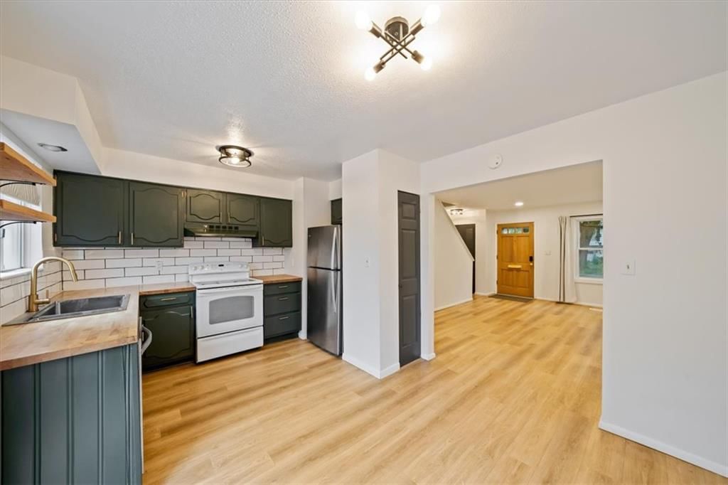 Photo 10 of 28 - 8727 Sycamore Avenue, Kansas City, MO 64138