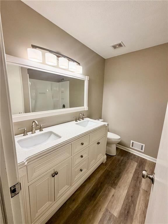 Double vanity, white vanity and renovated bathrooms at 3831 S Kiger Road, Independence, MO 64055