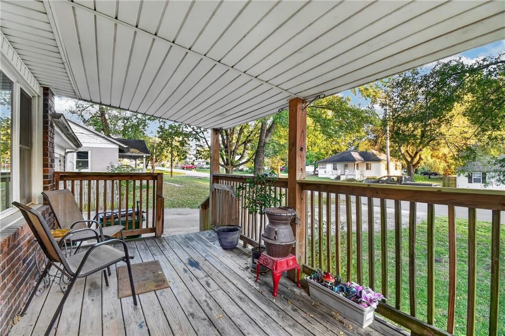 Photo 6 of 39 - 440 W Broadway Street, Peculiar, MO 64078