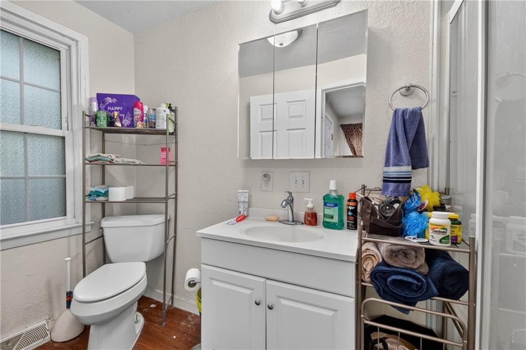 White vanity at 440 W Broadway Street, Peculiar, MO 64078