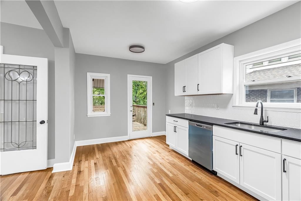 White kitchen, stainless steel appliances and updated kitchen at 710 N 17th Street, Kansas City, KS 66102