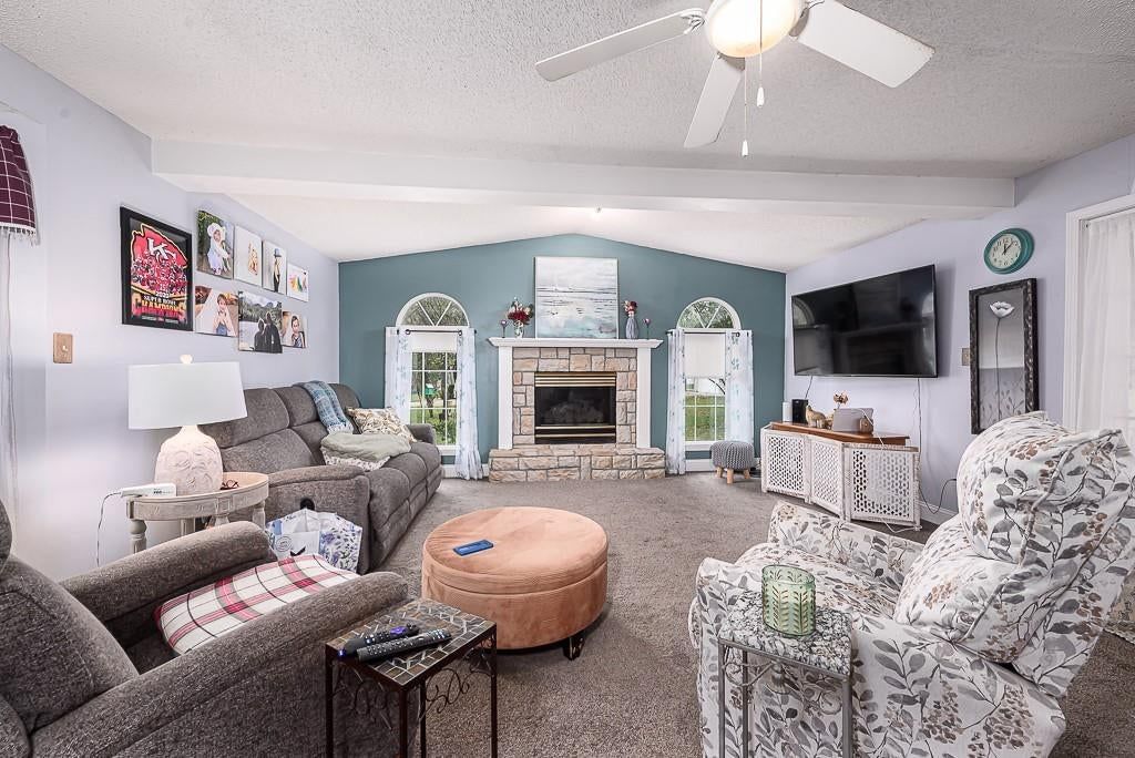 Fireplace and carpet at 15552 Ripley Street, Basehor, KS 66007