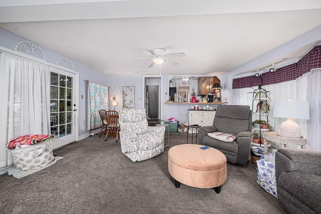 Kitchen open to the living area at 15552 Ripley Street, Basehor, KS 66007