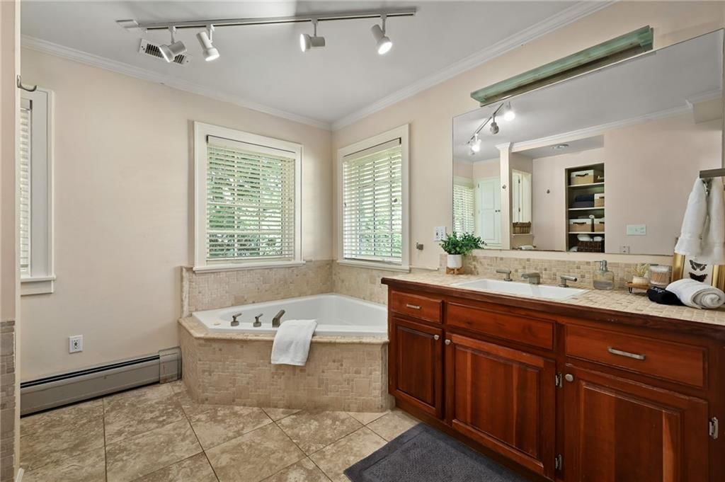 Double vanity and wood vanity at 7444 Mercier Street, Kansas City, MO 64114