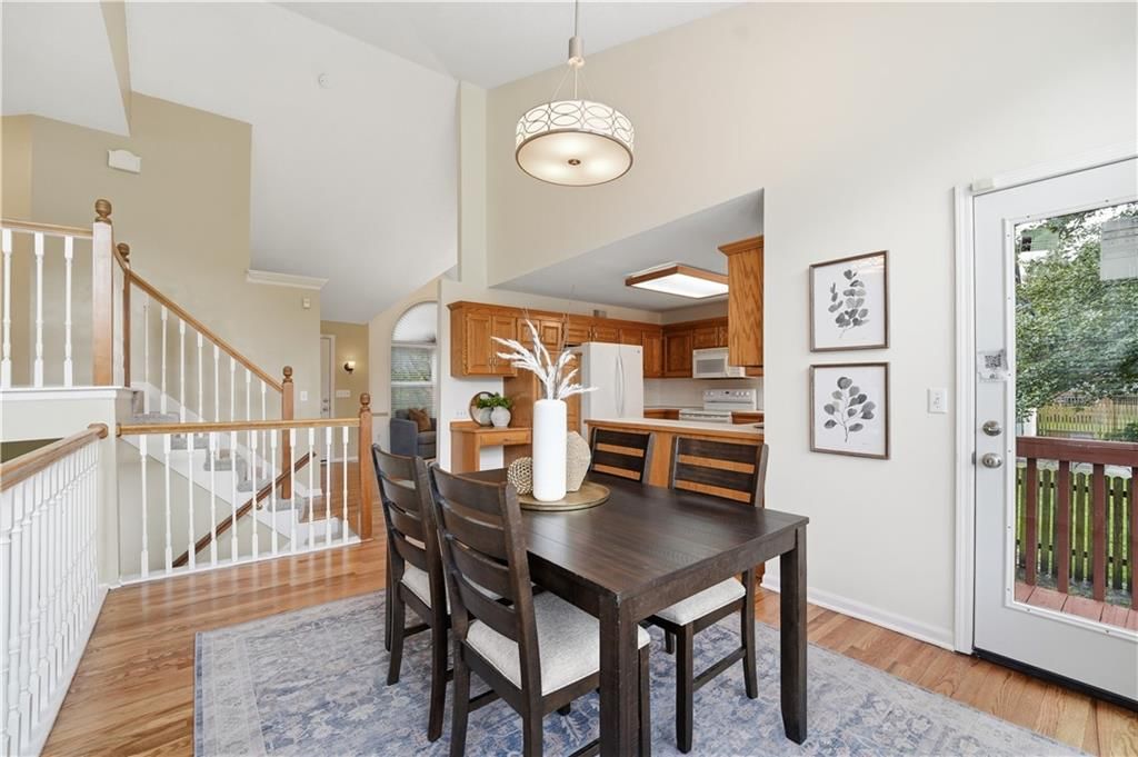 Open floor plan, wall of windows and breakfast nook at 18470 W 161ST Street, Olathe, KS 66062