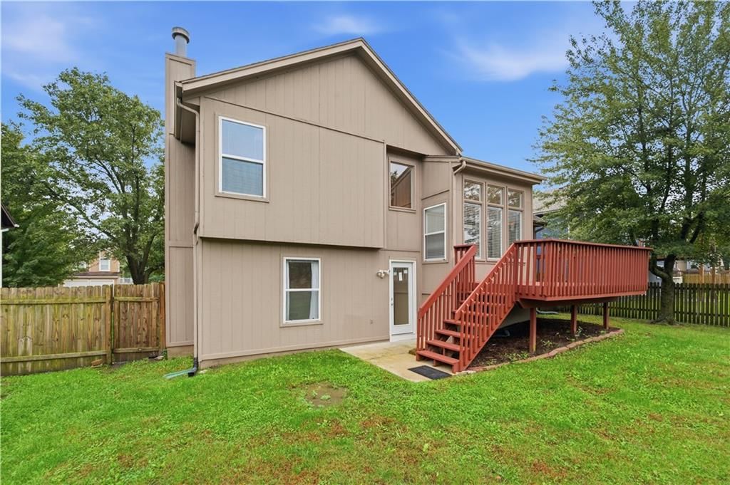 Deck, big backyard and fenced yard at 18470 W 161ST Street, Olathe, KS 66062