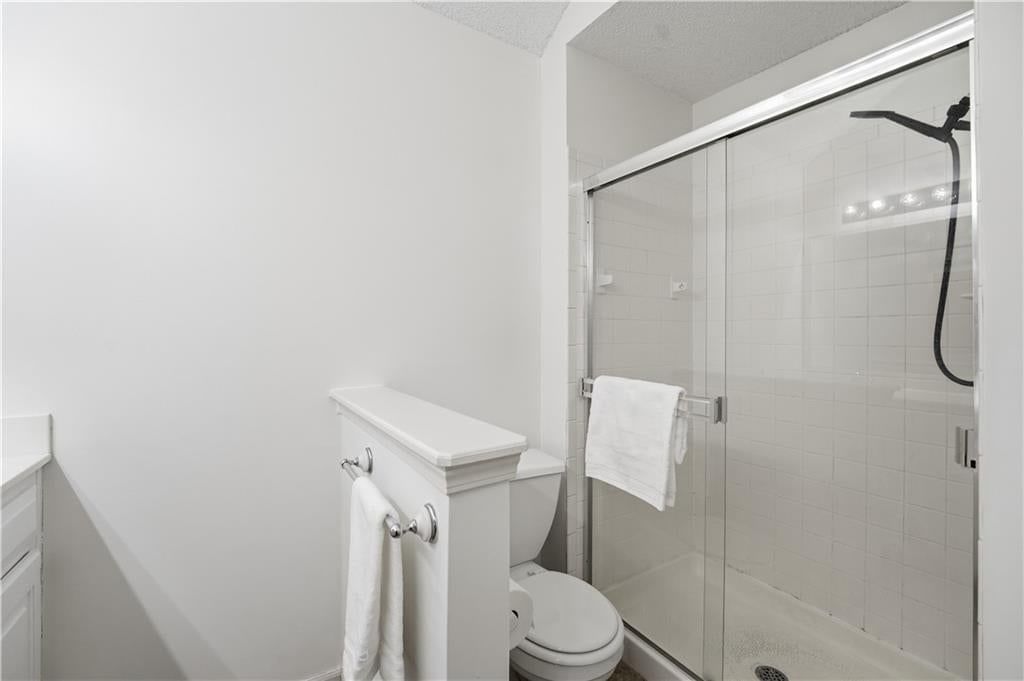 Walk-in shower and tiled shower at 18470 W 161ST Street, Olathe, KS 66062