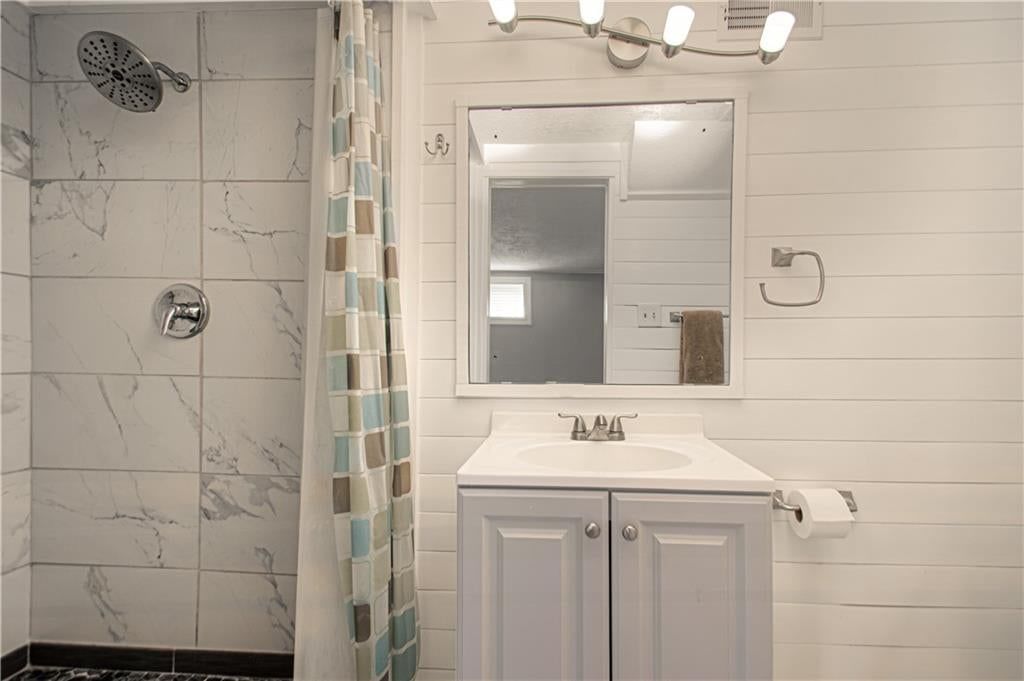 Tiled shower at 10006 Benson Street, Overland Park, KS 66212