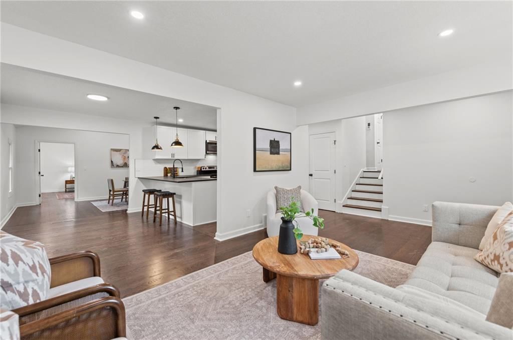 Open floor plan and staircase at 8108 E 92nd Terrace, Kansas City, MO 64138