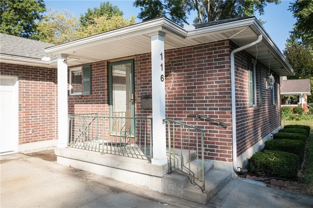 Covered front porch at 116 Sibley Street, Buckner, MO 64016