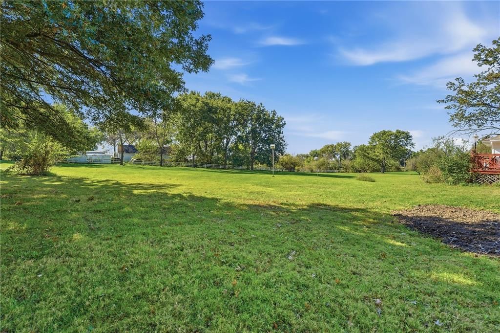 Big backyard and flat lot at 5905 E 210th Street, Belton, MO 64012