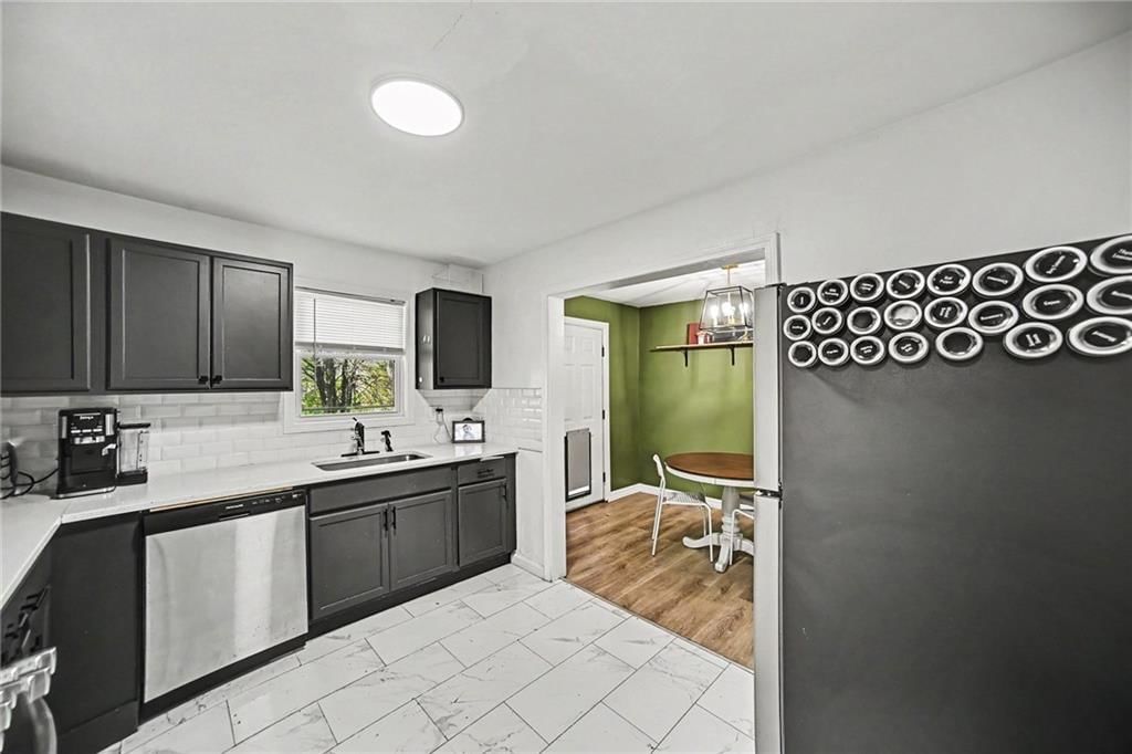 Photo 7: painted kitchen cabinets, 7844 SMALLEY Avenue, Kansas City, MO 64138
