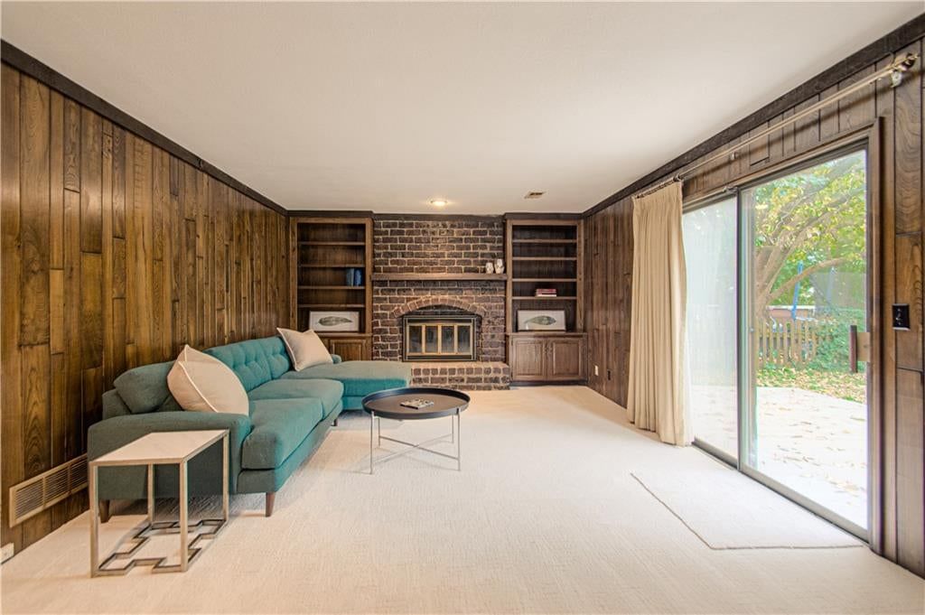 Finished basement, fireplace and staircase at 9835 W 101st Street, Overland Park, KS 66212