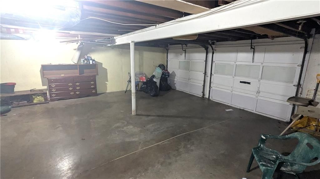 Attached garage at 8507 Spring Valley Road, Raytown, MO 64138