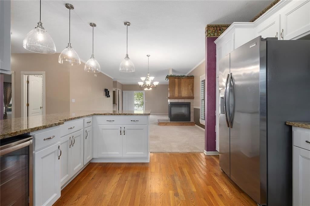 Open floor plan at 12133 S Valley Road, Olathe, KS 66061