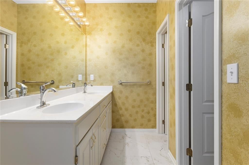 Double vanity, white vanity and chrome hardware at 12133 S Valley Road, Olathe, KS 66061
