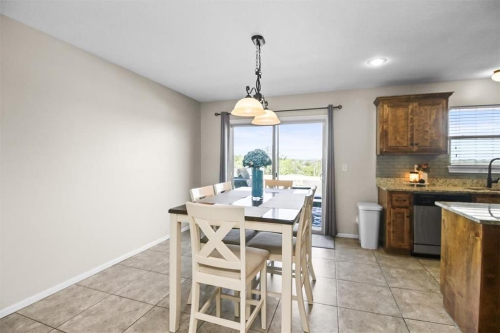 Tile floors and breakfast nook at 1252 NW High View Drive, Grain Valley, MO 64029