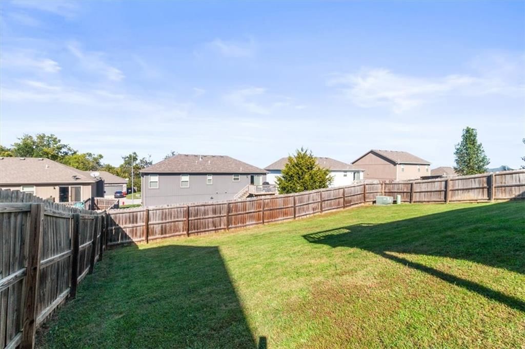 Big backyard, fenced yard and flat lot at 1252 NW High View Drive, Grain Valley, MO 64029
