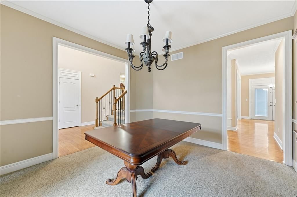 Statement lighting and wainscoting or board and batten at 10303 N Dallas Avenue, Kansas City, MO 64154
