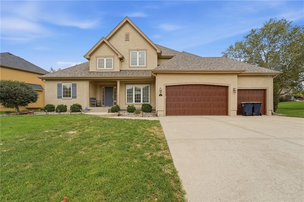 Big backyard, fenced yard and mature trees at 10303 N Dallas Avenue, Kansas City, MO 64154