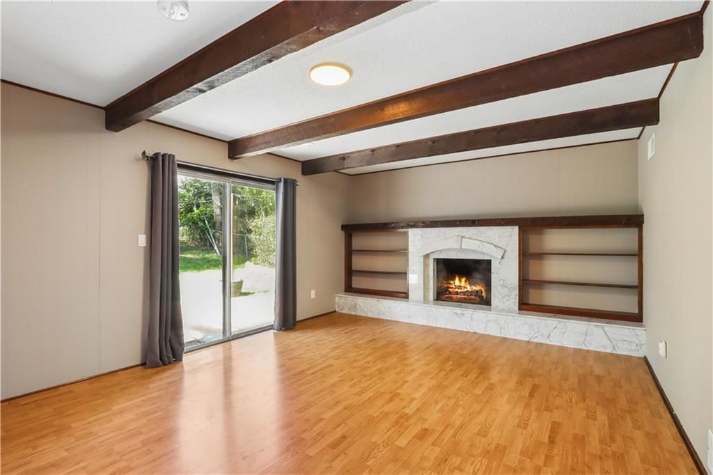 Fireplace, pergola and covered patio at 9532 Benson Street, Overland Park, KS 66212