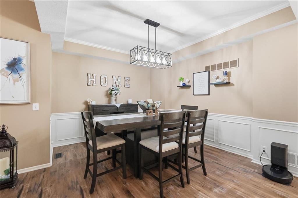 Statement lighting and wainscoting or board and batten at 11226 N Belleview Avenue, Kansas City, MO 64155