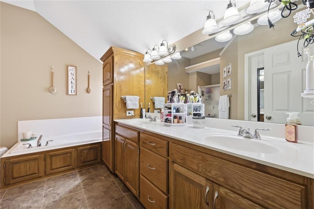 Double vanity and wood vanity at 11226 N Belleview Avenue, Kansas City, MO 64155