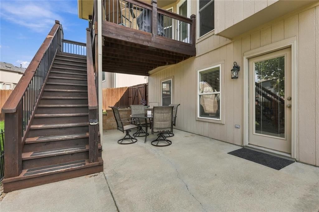 Fenced yard, wood fence and flat lot at 11226 N Belleview Avenue, Kansas City, MO 64155
