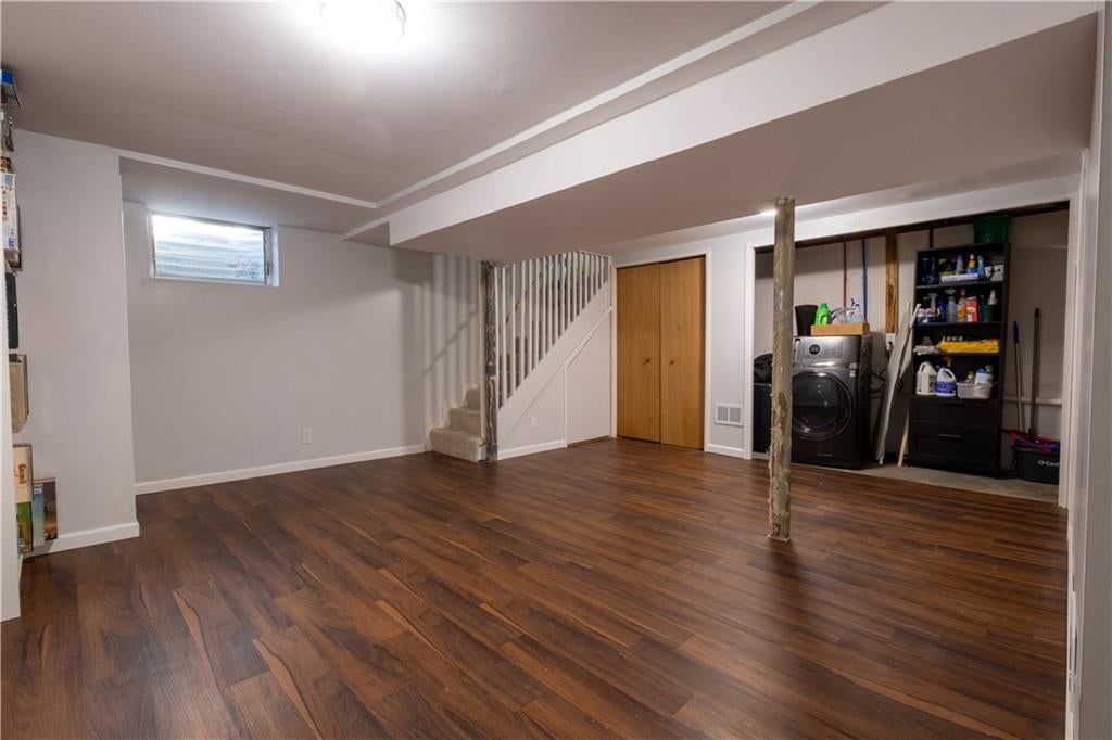 Finished basement and staircase at 1152 NE 84th Terrace, Kansas City, MO 64155