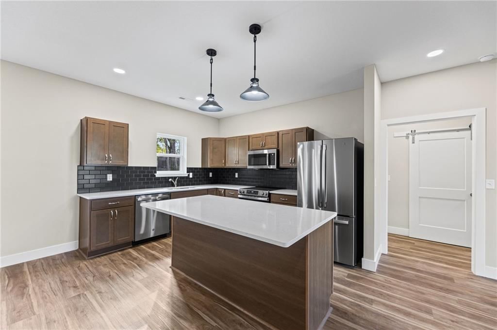 Photo 13 of 41 - 915 5th Street Terrace, Osawatomie, KS 66064