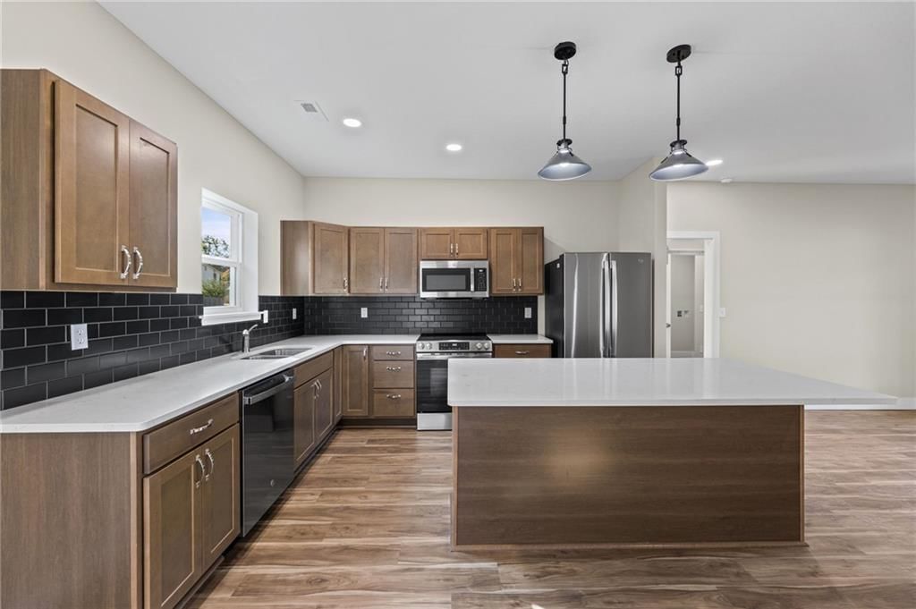 Photo 14 of 41 - 915 5th Street Terrace, Osawatomie, KS 66064