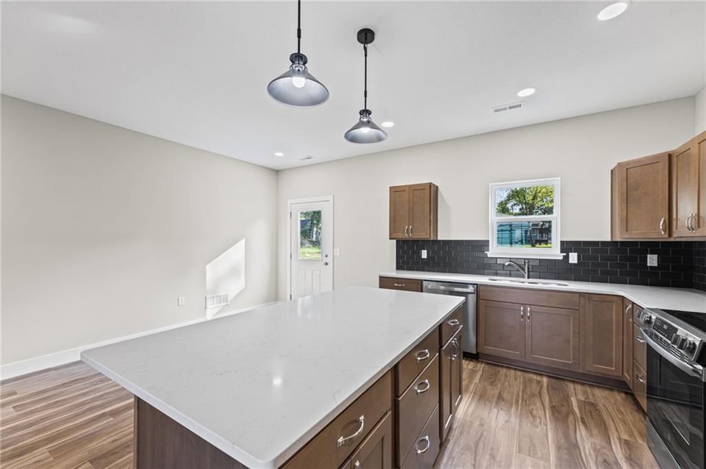 Photo 16 of 41 - 915 5th Street Terrace, Osawatomie, KS 66064