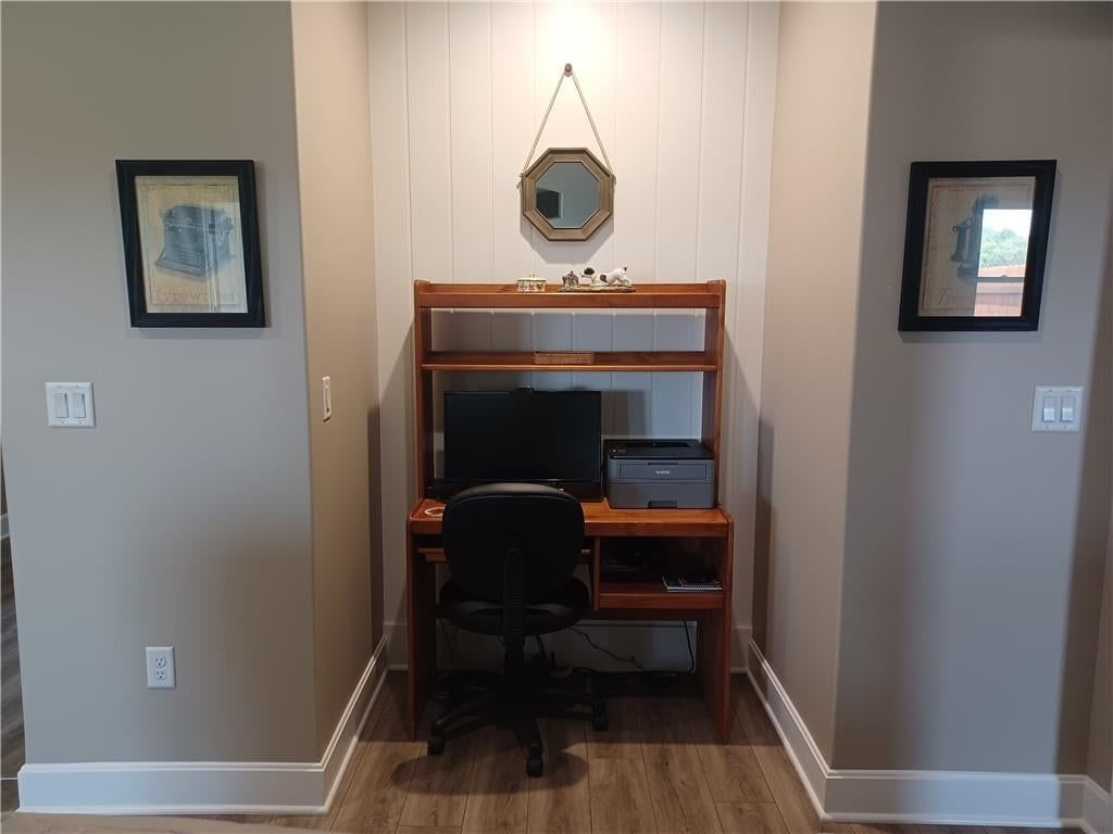 Home office, wainscoting or board and batten and shiplap / paneling at 916 Cedar Court, Paola, KS 66071