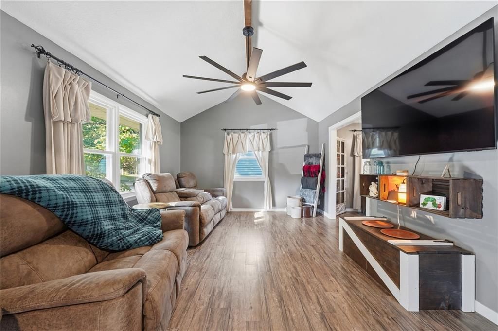Ceiling beams and gray walls at 1305 Madison Street, Lee's Summit, MO 64081