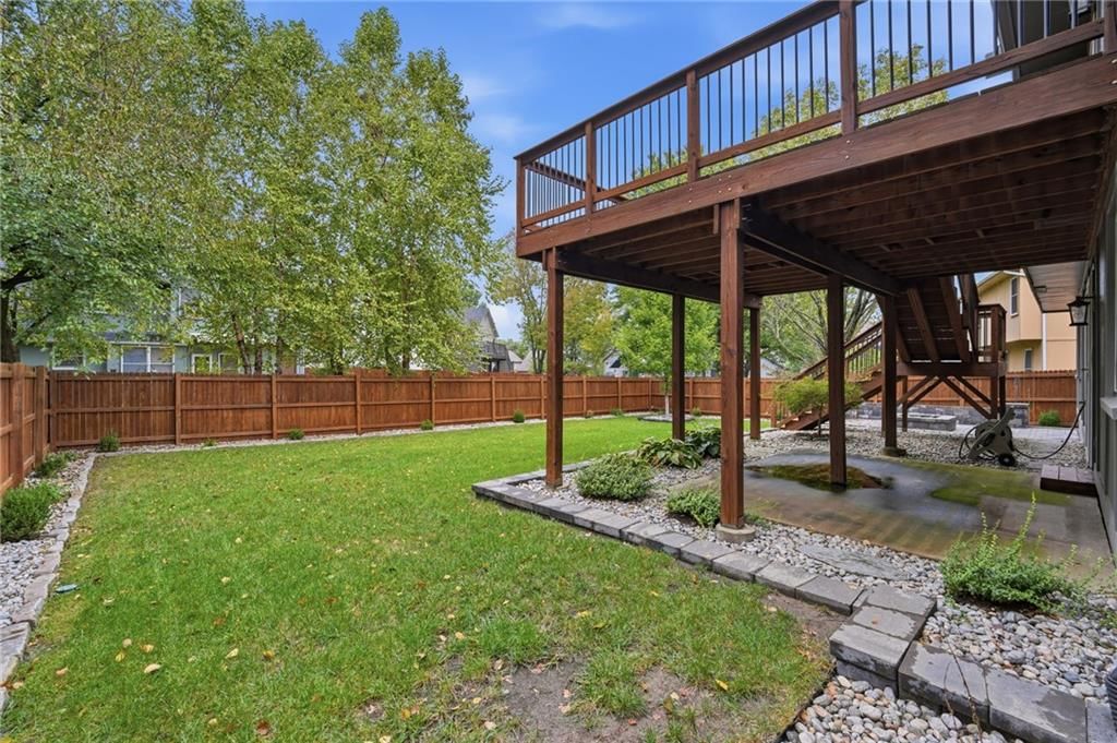Deck, big backyard and fenced yard at 15762 Horton Street, Overland Park, KS 66223
