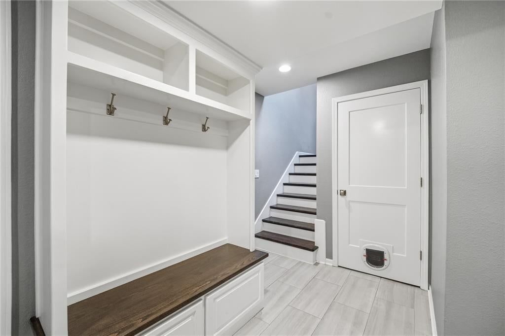 Finished basement, tile floors and mudroom built-ins at 15762 Horton Street, Overland Park, KS 66223