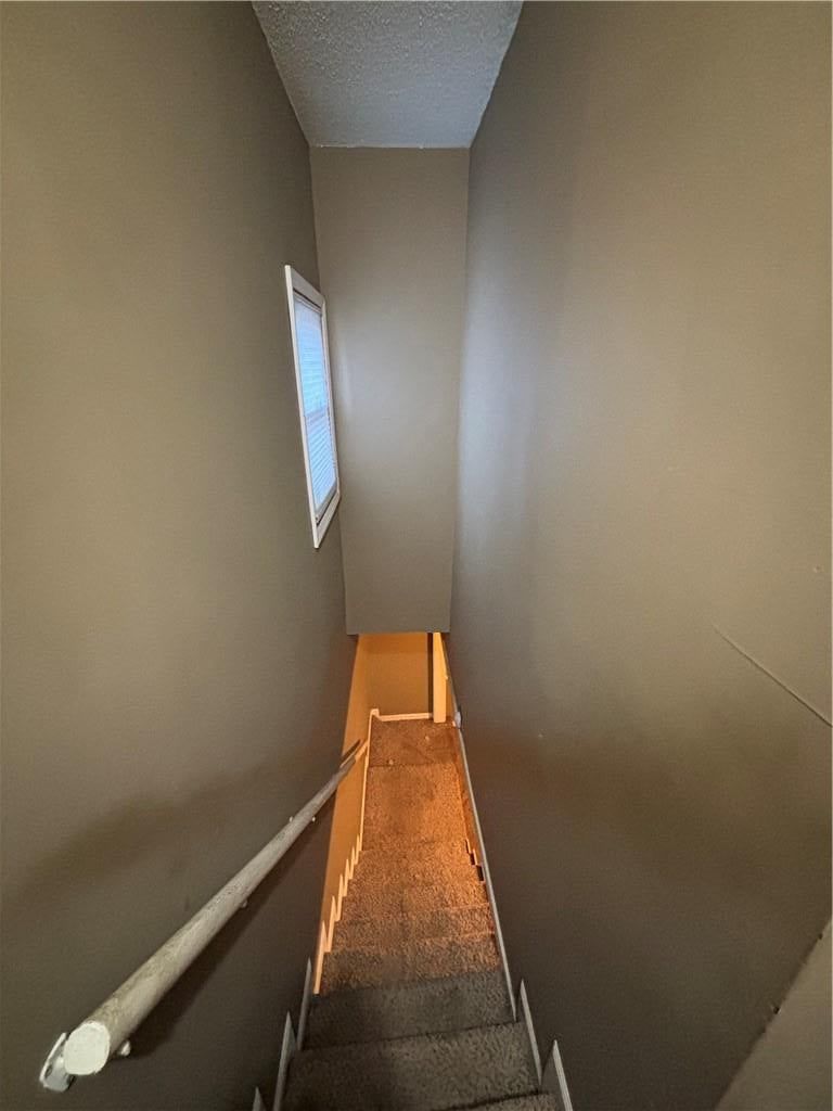 Wood stair railing at 320 Martin Avenue, Osawatomie, KS 66064