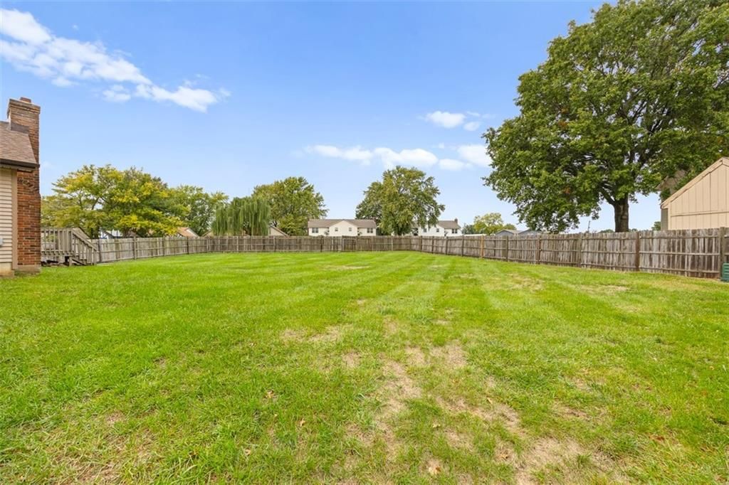 Big backyard and mature trees at 2840 S 54th Terrace, Kansas City, KS 66106