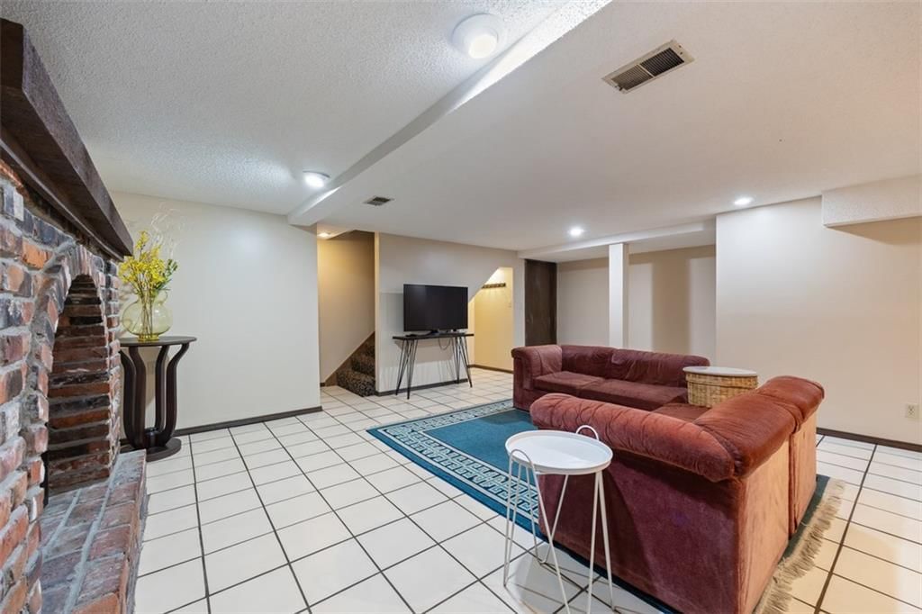 Finished basement, tile floors and recessed lighting at 2840 S 54th Terrace, Kansas City, KS 66106