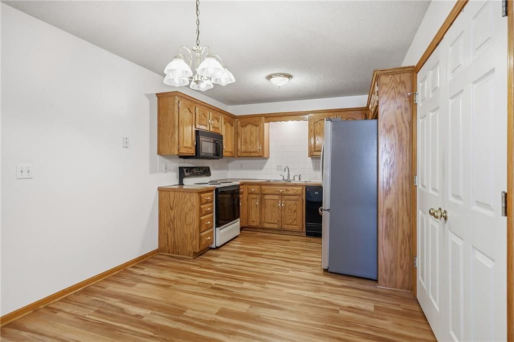 Photo 9 of 51 - 10504-06 Maple Avenue, Peculiar, MO 64078
