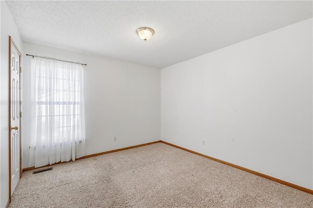 Photo 16 of 51 - 10504-06 Maple Avenue, Peculiar, MO 64078