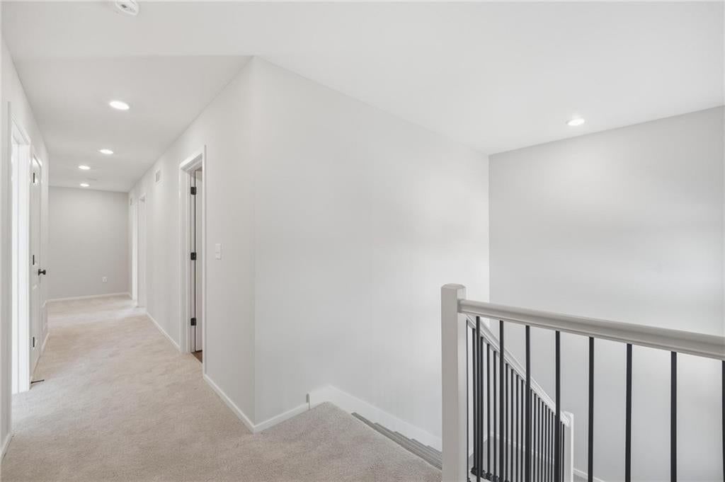 Iron stair railing at 1601 SW 10th Terrace, Oak Grove, MO 64075