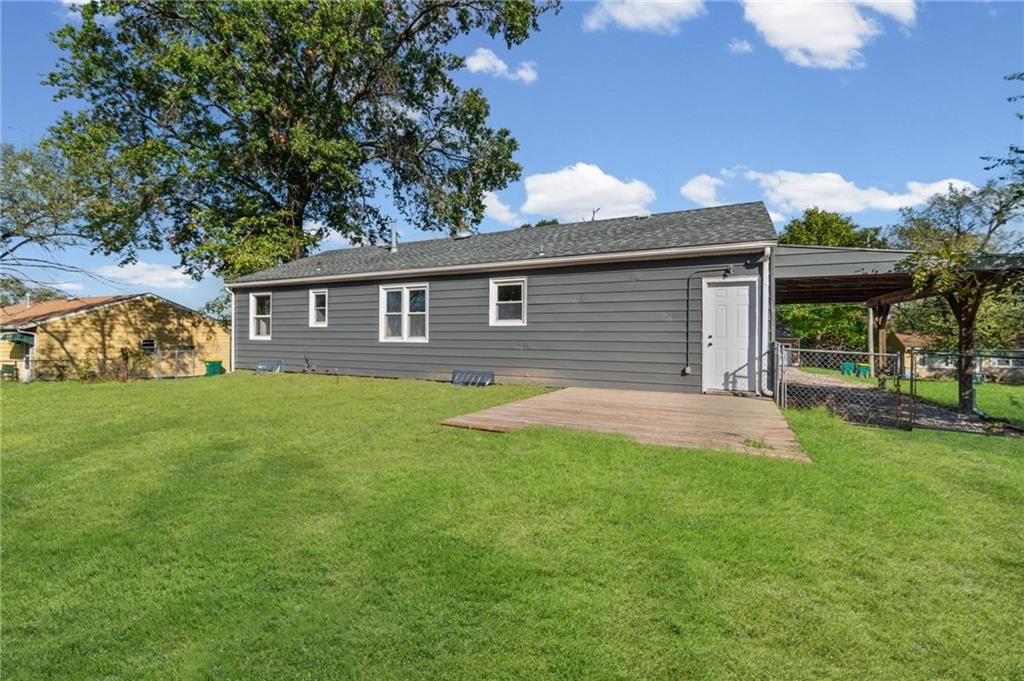 Deck, big backyard and fenced yard at 4311 Yecker Avenue, Kansas City, KS 66104