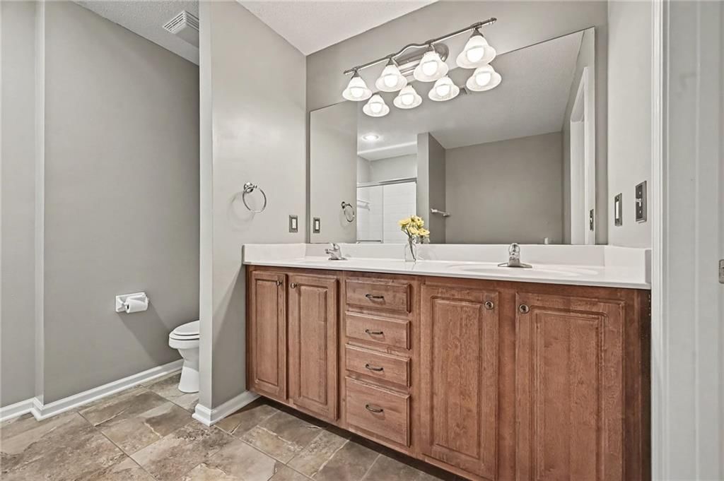 Double vanity and wood vanity at 7313 McCoy Street, Shawnee, KS 66227