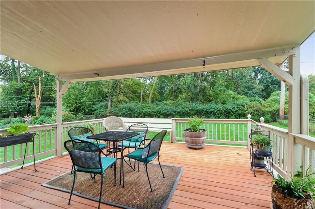 Deck, covered patio and wood deck at 4107 E 107th Terrace, Kansas City, MO 64137