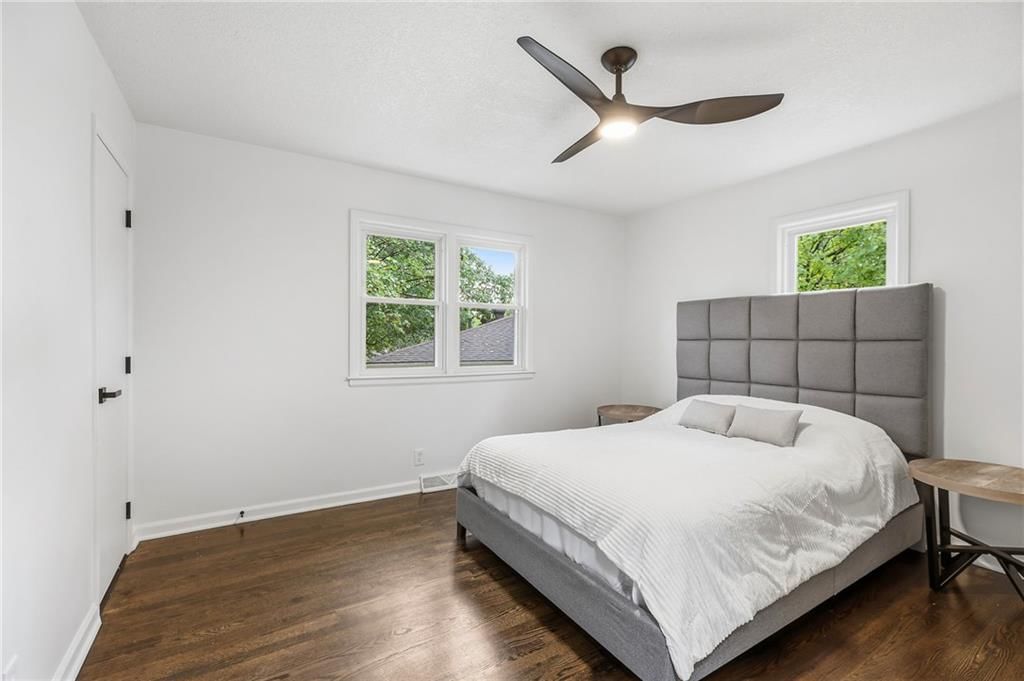 Main-floor primary bedroom at 5008 Spring Street, Kansas City, MO 64133