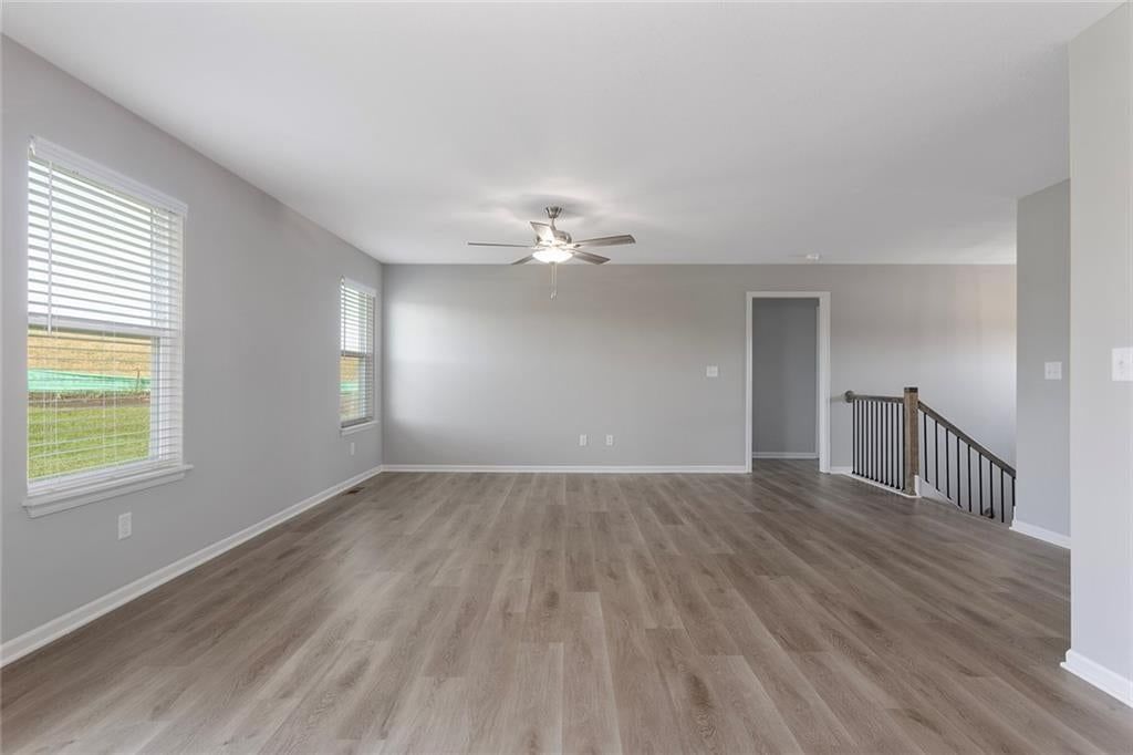 White trim and gray walls at 523 Lemon Mint Drive, Raymore, MO 64083