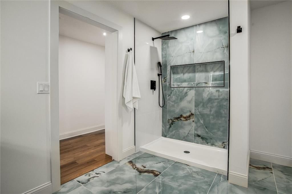 Walk-in shower, tiled shower and frameless glass shower at 24050 W 55th Street, Shawnee, KS 66226